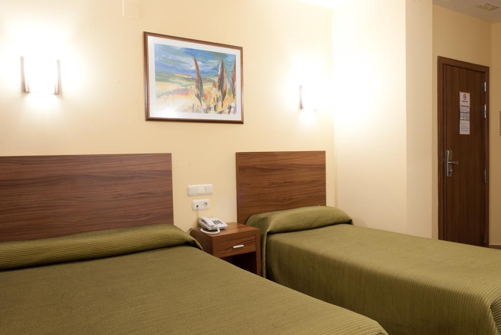Hotel Hidalgo Quijada ألكازار دي سان خوان المظهر الخارجي الصورة